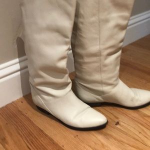 Off white colored flat boots